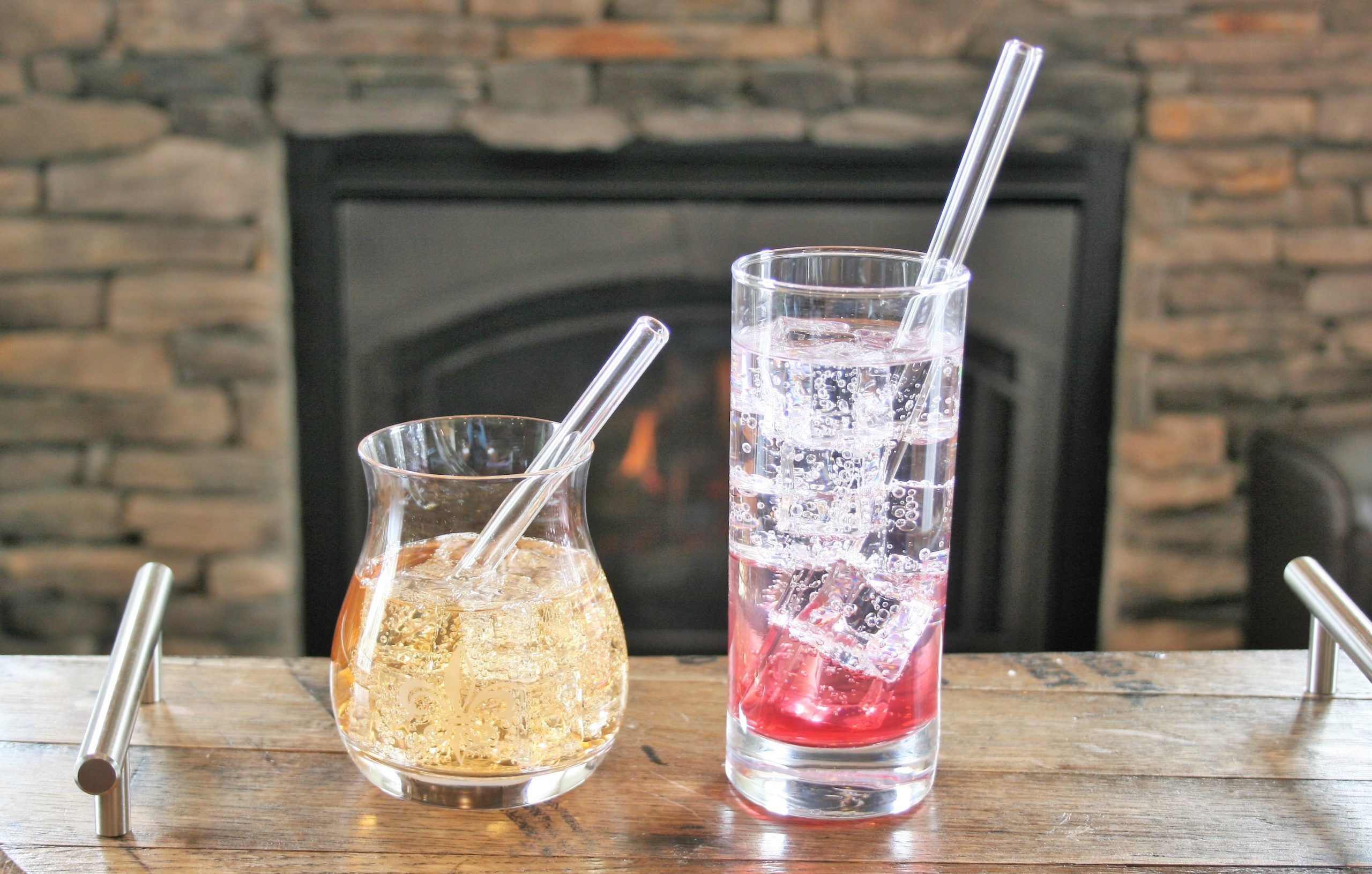 https://whiskeybytheglass.com/wp-content/uploads/2018/11/cocktails-with-glass-straws-scaled.jpg