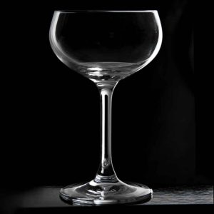 retro coupe glass by urban bar with blackground