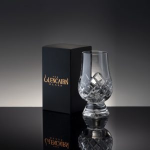 Glencairn cut crystal whiskey glass with black presentation box gray background