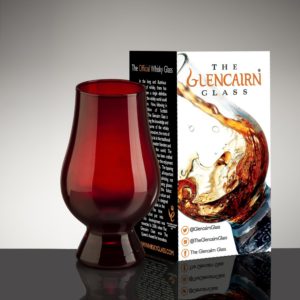red glencairn whiskey glass with box gray background
