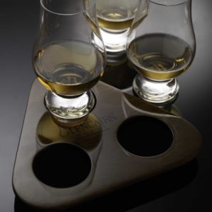 three glencairn glasses and tasting tray