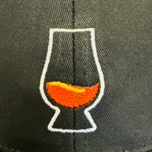 closeup of Glencairn logo on hat